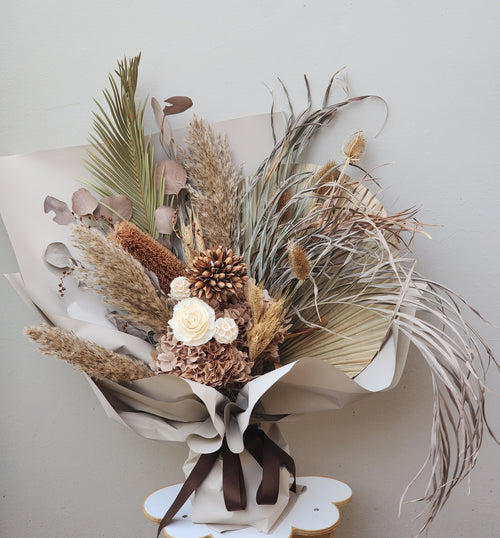 Boho dried flower bouquet full view with pampas grass and banksia